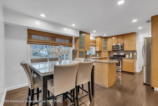 Dining room, Interior, Kitchen, Recessed Lighting, Stainless Steel Appliances, Wood Texture Flooring
