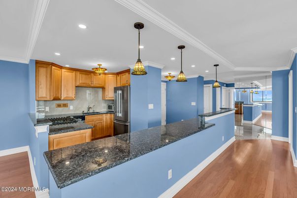 Interior, Kitchen, Pendant Lights, Recessed Lighting, Stainless Steel Appliances, Wood Texture Flooring