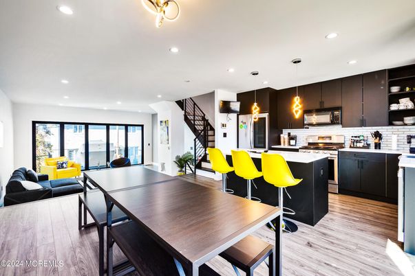 Dining room, Interior, Kitchen, Pendant Lights, Recessed Lighting, Stainless Steel Appliances, Wood Texture Flooring