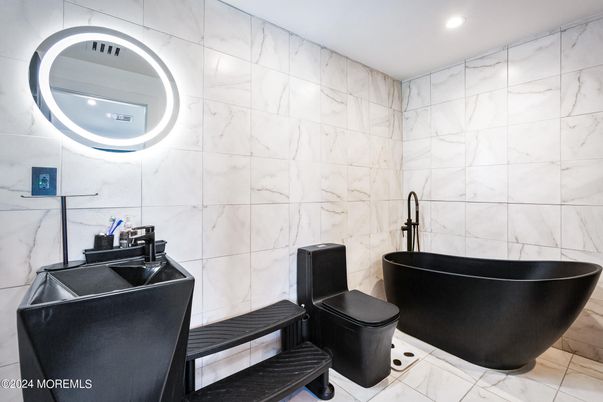 Bathroom, Free Standing Baths, Interior, Marble, Marble Walls, Recessed Lighting