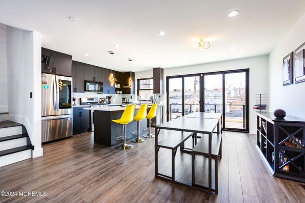 Dining room, Interior, Kitchen, Recessed Lighting, Stainless Steel Appliances, Wood Texture Flooring