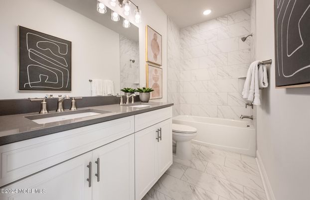 Bathroom, Dual Sink Vanities, Interior, Marble, Marble Walls, Recessed Lighting