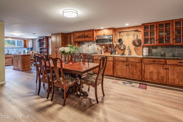 Dining room, Interior, Kitchen, Recessed Lighting, Stainless Steel Appliances, Wood Texture Flooring