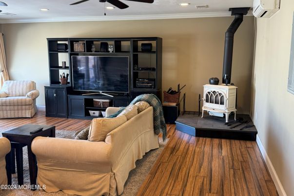 Fireplace, Interior, Living room, Recessed Lighting, Wood Texture Flooring