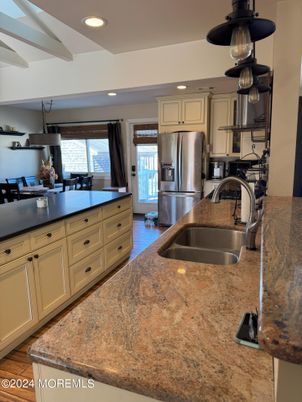Dining room, Interior, Kitchen, Recessed Lighting, Stainless Steel Appliances, Wood Texture Flooring