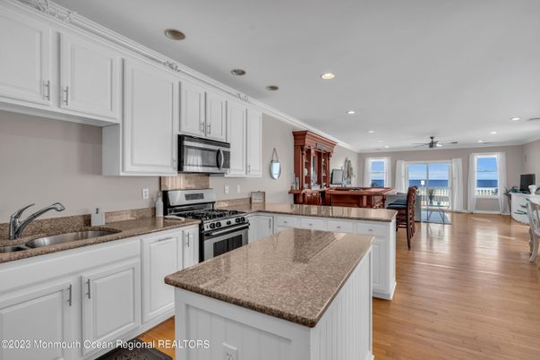Dining room, Interior, Kitchen, Recessed Lighting, Stainless Steel Appliances, Wood Texture Flooring
