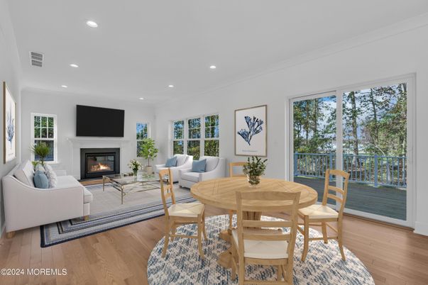 Dining room, Fireplace, Interior, Living room, Recessed Lighting, Wood Texture Flooring