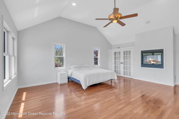 Bedroom, Fireplace, Interior, Recessed Lighting, Wood Texture Flooring