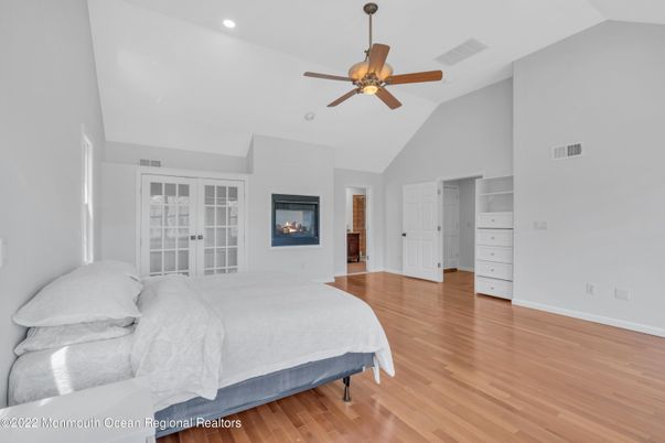 Bedroom, Fireplace, Interior, Recessed Lighting, Wood Texture Flooring