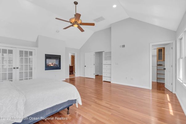 Bedroom, Fireplace, Interior, Recessed Lighting, Wood Texture Flooring