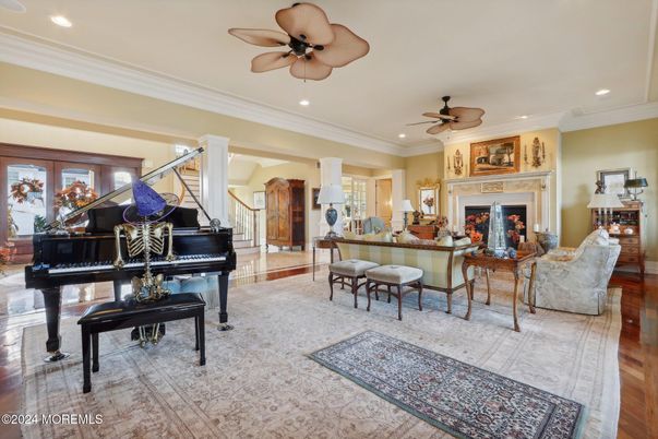 Fireplace, Interior, Living room, Piano, Recessed Lighting, Wood Texture Flooring
