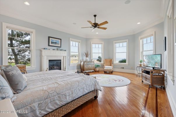 Bedroom, Fireplace, Interior, Recessed Lighting, Wood Texture Flooring