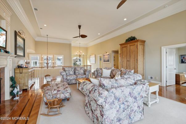 Chandelier, Fireplace, Interior, Living room, Recessed Lighting, Wood Texture Flooring