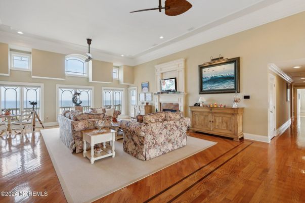 Dining room, Fireplace, Interior, Living room, Pendant Lights, Recessed Lighting, Wood Texture Flooring