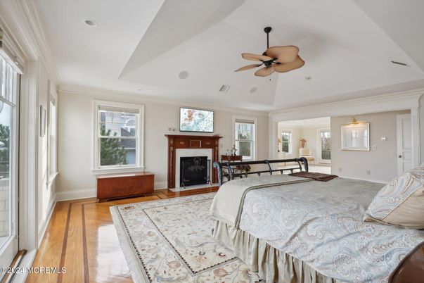 Bedroom, Fireplace, Interior, Pendant Lights, Recessed Lighting, Wood Texture Flooring