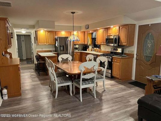 Dining room, Interior, Kitchen, Pendant Lights, Stainless Steel Appliances, Wood Texture Flooring
