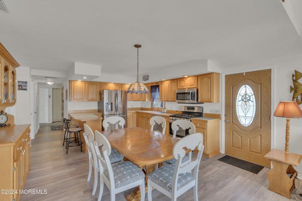 Dining room, Interior, Kitchen, Pendant Lights, Stainless Steel Appliances, Wood Texture Flooring