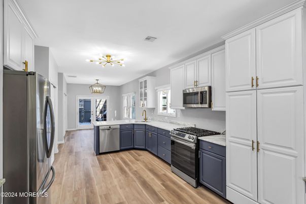 Chandelier, Interior, Kitchen, Stainless Steel Appliances, Wood Texture Flooring