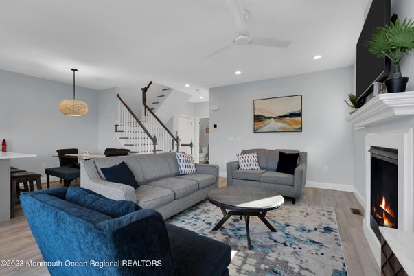 Dining room, Fireplace, Interior, Living room, Pendant Lights, Recessed Lighting, Wood Texture Flooring