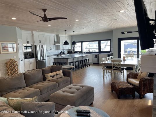 Dining room, Interior, Kitchen, Living room, Pendant Lights, Recessed Lighting, Stainless Steel Appliances, Wooden Ceilings, Wood Texture Flooring