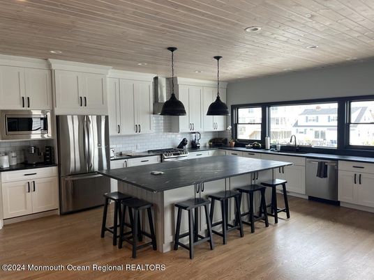 Interior, Kitchen, Pendant Lights, Recessed Lighting, Stainless Steel Appliances, Wooden Ceilings, Wood Texture Flooring