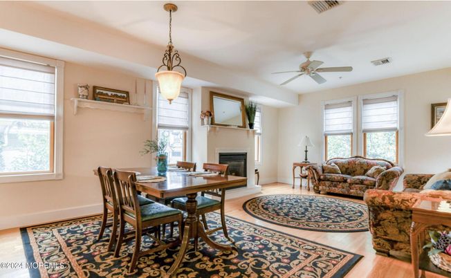 Dining room, Fireplace, Interior, Living room, Pendant Lights, Wood Texture Flooring