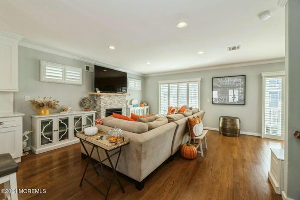 Fireplace, Interior, Living room, Recessed Lighting, Wood Texture Flooring