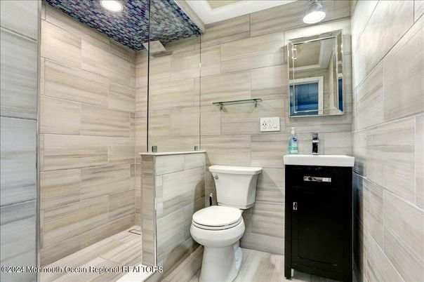 Bathroom, Glass Shower, Interior, Recessed Lighting, Wood Texture Flooring