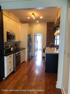 Interior, Kitchen, Recessed Lighting, Stone Walls, Wood Texture Flooring
