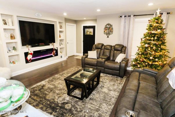 Fireplace, Interior, Living room, Recessed Lighting, Wood Texture Flooring