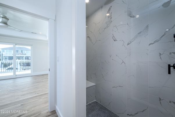 Bathroom, Interior, Marble Walls, Recessed Lighting, Wood Texture Flooring