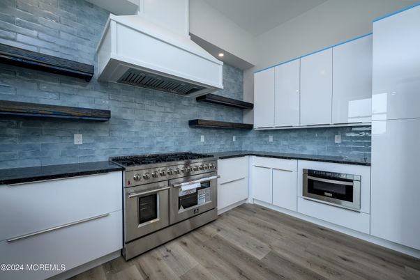 Interior, Kitchen, Recessed Lighting, Stainless Steel Appliances, Stone Walls, Wood Texture Flooring