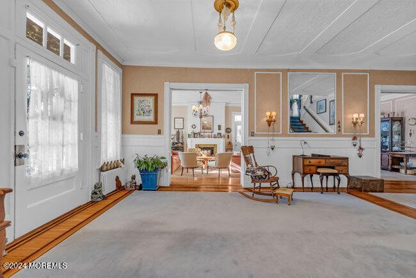 Chandelier, Dining room, Fireplace, Interior, Living room, Pendant Lights, Wood Texture Flooring
