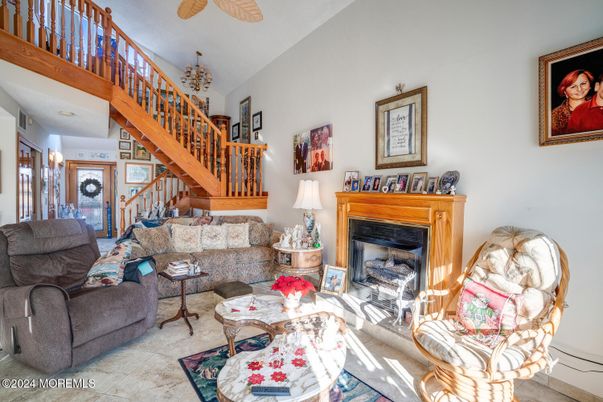 Chandelier, Fireplace, Interior, Living room