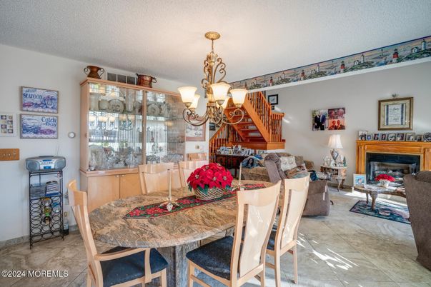 Chandelier, Dining room, Fireplace, Interior, Living room, Pendant Lights