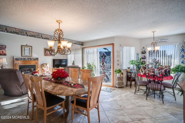 Chandelier, Dining room, Fireplace, Interior