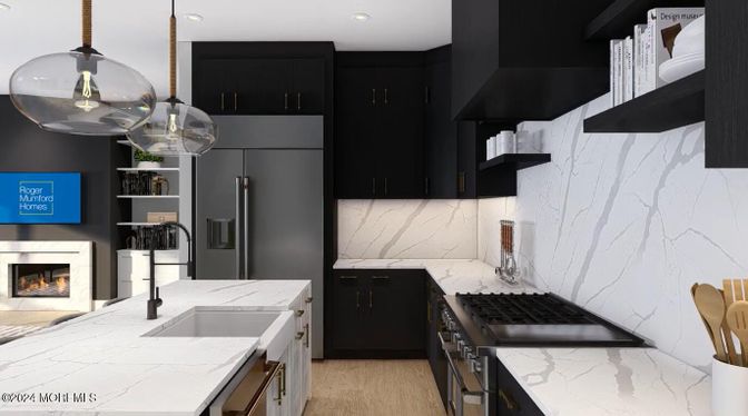 Fireplace, Interior, Kitchen, Marble Walls, Pendant Lights, Recessed Lighting, Stainless Steel Appliances