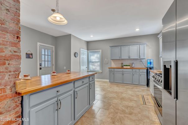 Interior, Kitchen, Pendant Lights, Recessed Lighting, Stainless Steel Appliances, Stone Walls