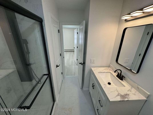 Bathroom, Dual Sink Vanities, Glass Shower, Interior, Marble Walls