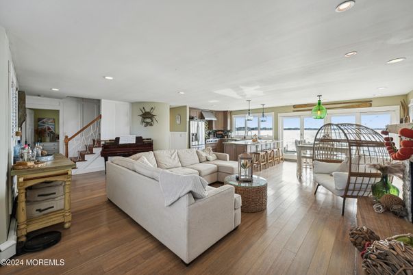 Dining room, Interior, Kitchen, Living room, Pendant Lights, Recessed Lighting, Stainless Steel Appliances, Wood Texture Flooring