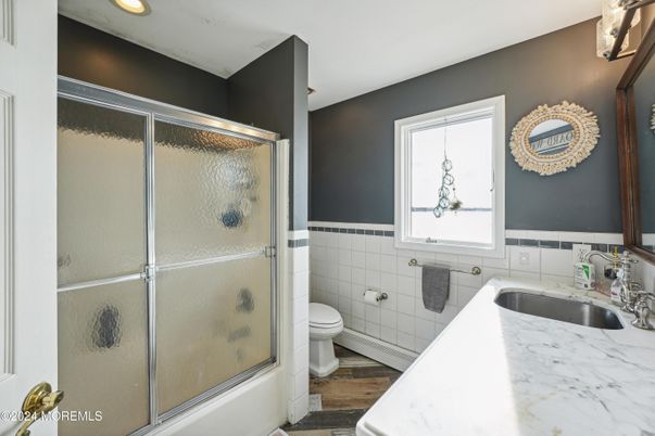Bathroom, Glass Shower, Interior, Recessed Lighting, Wood Texture Flooring