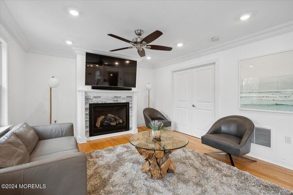 Fireplace, Interior, Living room, Recessed Lighting, Wood Texture Flooring