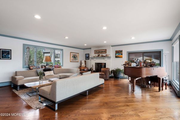 Fireplace, Interior, Living room, Piano, Recessed Lighting, Wood Texture Flooring