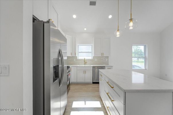 Interior, Kitchen, Pendant Lights, Recessed Lighting, Stainless Steel Appliances, Wood Texture Flooring