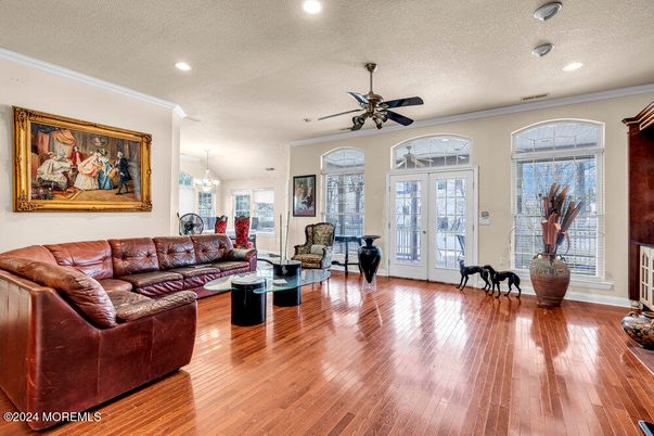 Chandelier, Fireplace, Interior, Living room, Recessed Lighting, Wood Texture Flooring