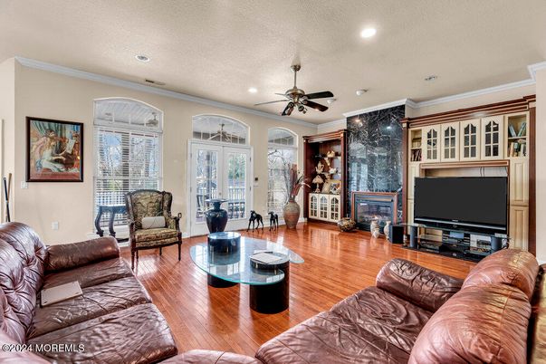 Fireplace, Interior, Living room, Recessed Lighting, Wood Texture Flooring