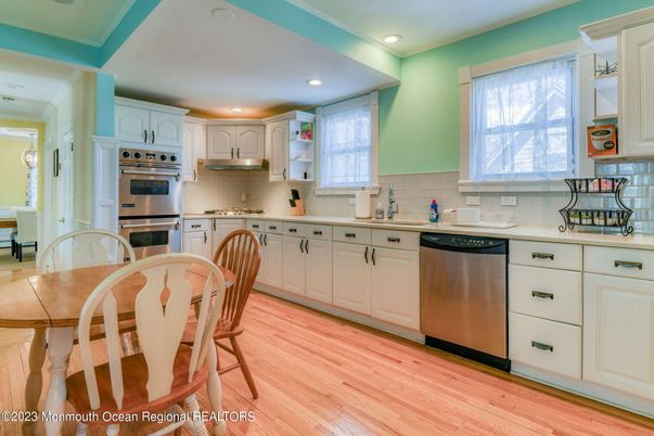 Dining room, Interior, Kitchen, Recessed Lighting, Stainless Steel Appliances, Wood Texture Flooring