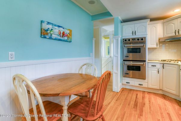 Dining room, Interior, Kitchen, Recessed Lighting, Stainless Steel Appliances, Wood Texture Flooring