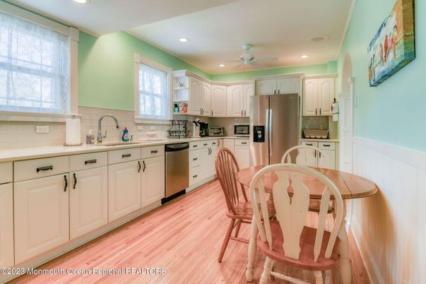 Dining room, Interior, Kitchen, Recessed Lighting, Stainless Steel Appliances, Wood Texture Flooring