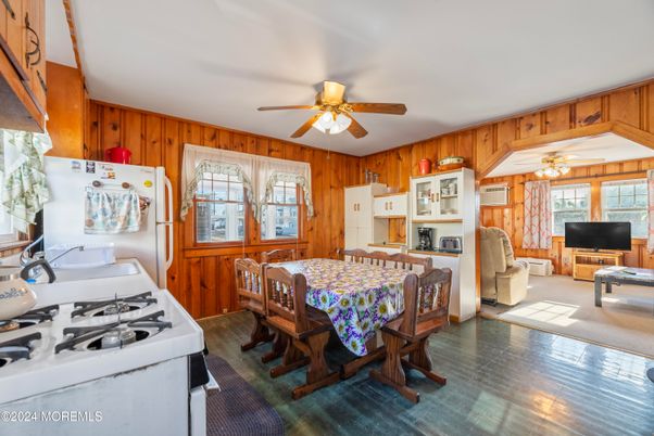 Dining room, Fireplace, Interior, Living room, Wood Texture Flooring, Wooden Walls